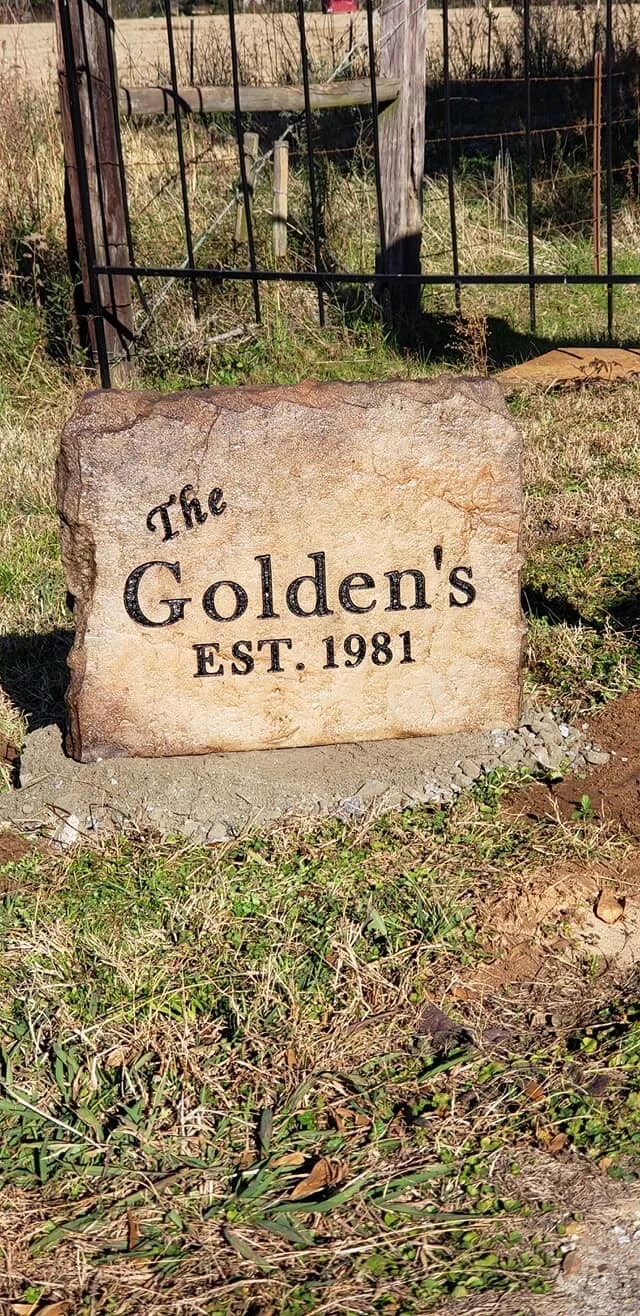Engraved boulder marker with gold-filled lettering